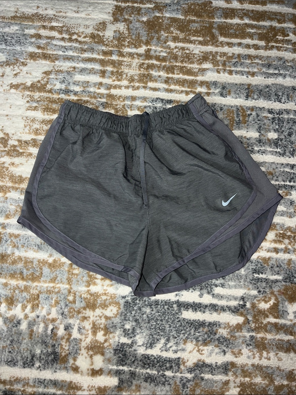 Nike Women's Gray Athletic Running Shorts with Silver Swoosh